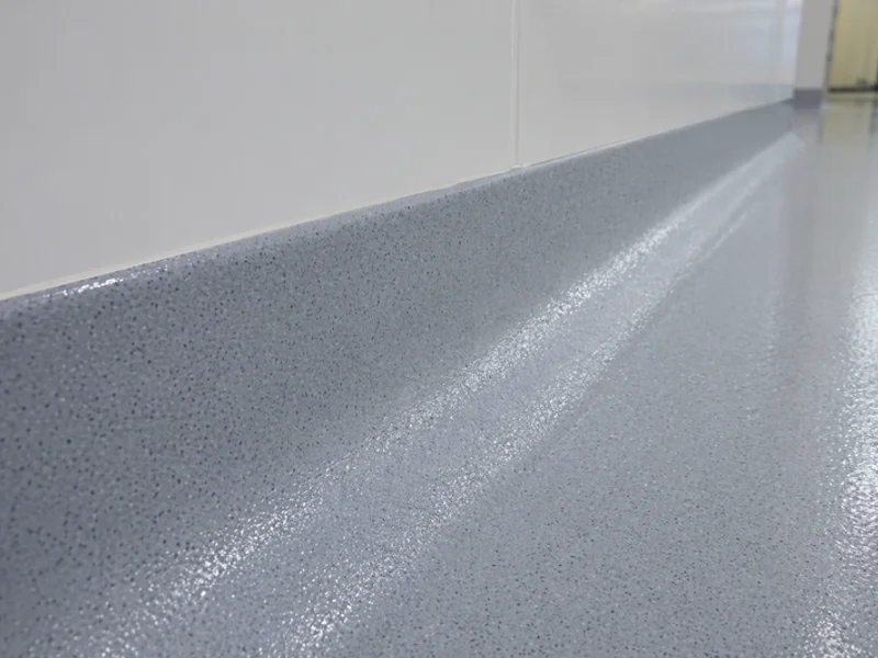 Integrated coving radius detail on hygienic PU system